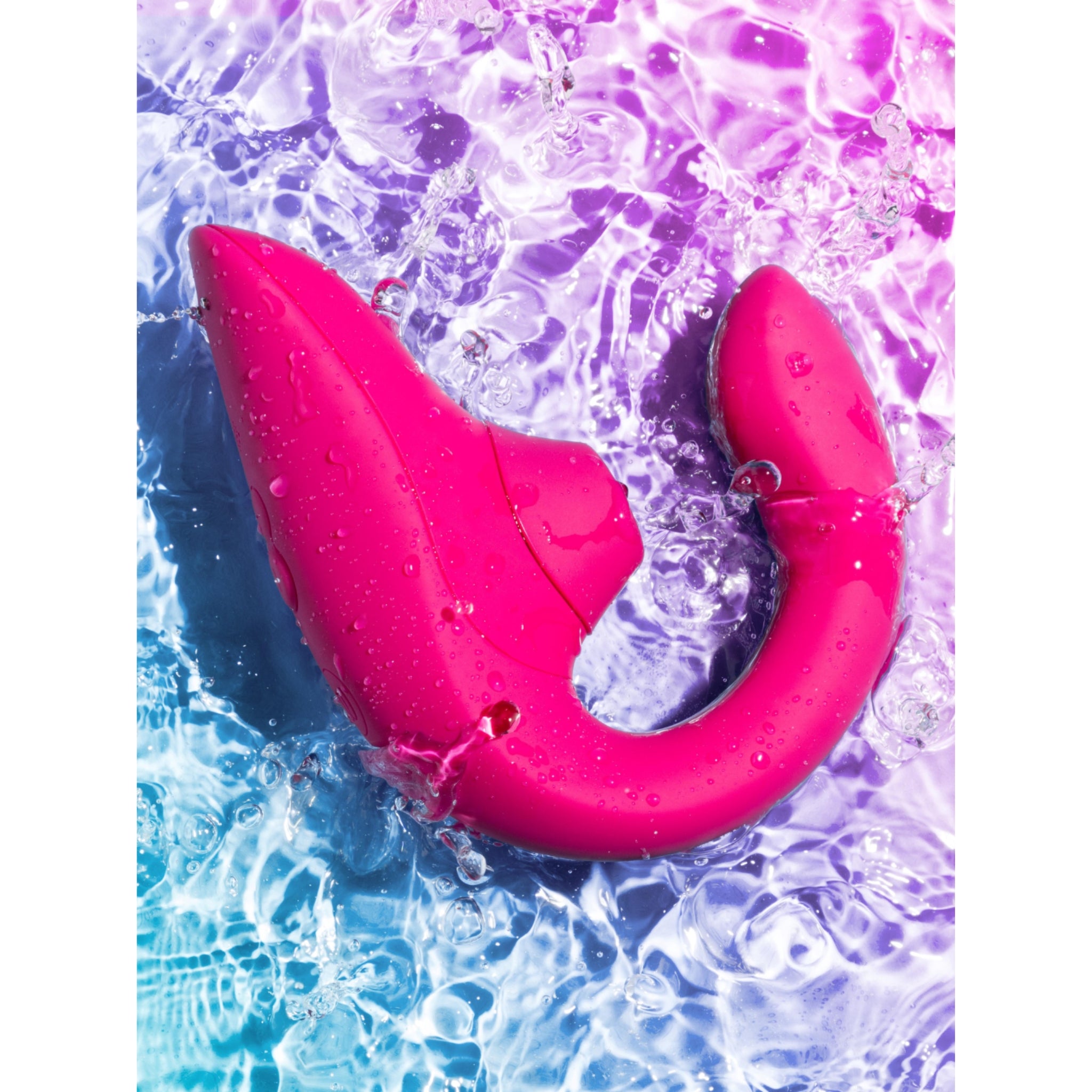 Elegant Womanizer Vibrator in water with soft lighting