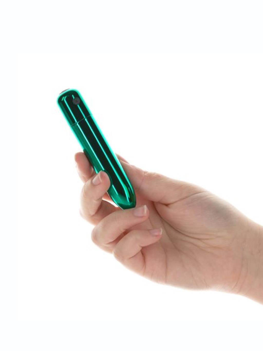 Swan Compact Bullet Point Vibrator held in hand, showing its petite size and curved tip for focused clitoral stimulation.