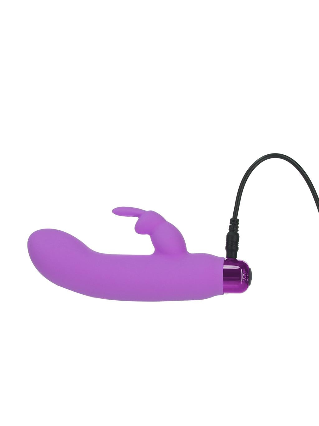 Bunny side profile highlighting ergonomic shape and dual motors with charger plugged in