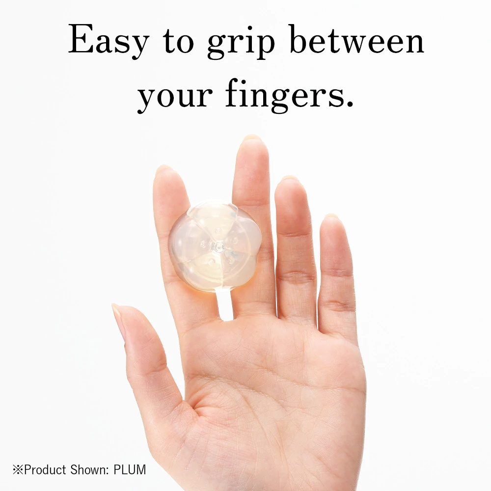 Compact Iroha Petit vibrator in hand, ready for warming, chilling, and one-time use