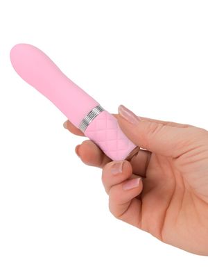 Pillow Talk Flirty – pink mini vibrator with flexible body, padded-texture handle, and sparkling crystal power button.