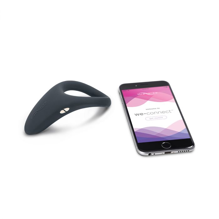We-Vibe Verge Premium vibrating cock ring displayed next to a phone dispaying we-connect app