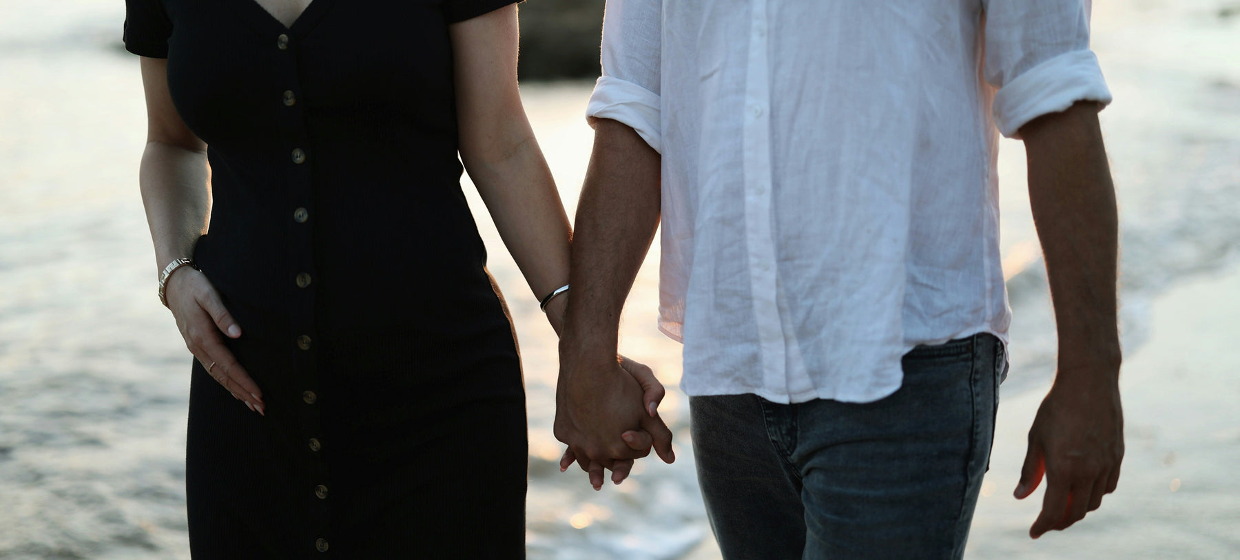 Couple connecting through touch and intimacy at home