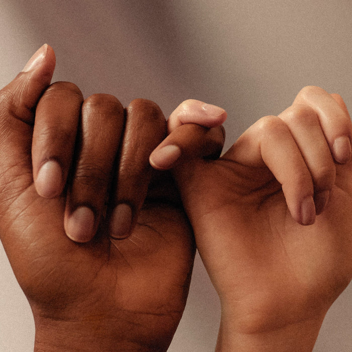 womens month banner - two women's pink promising