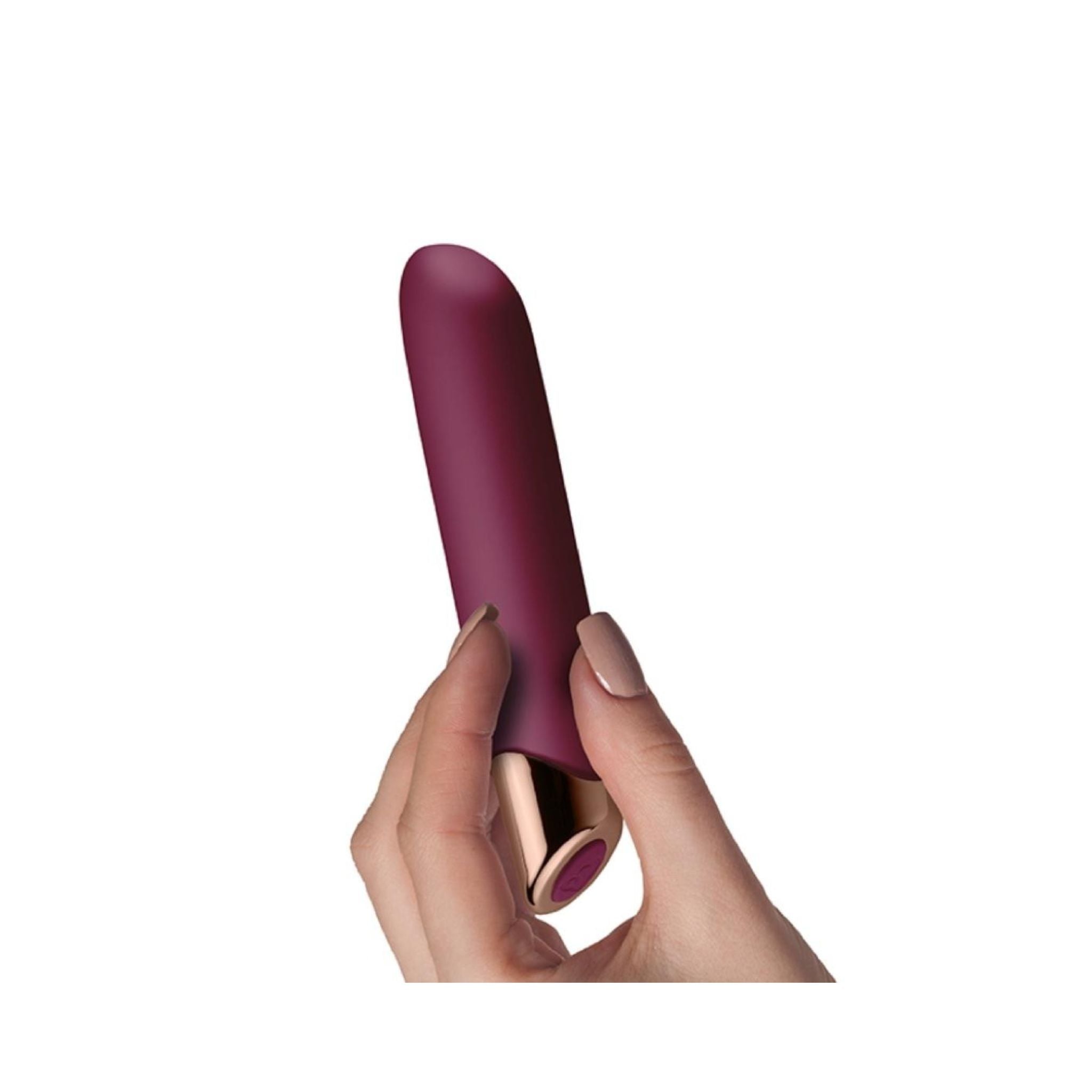 Hand holding the bullet vibrator, showing compact size and premium finish