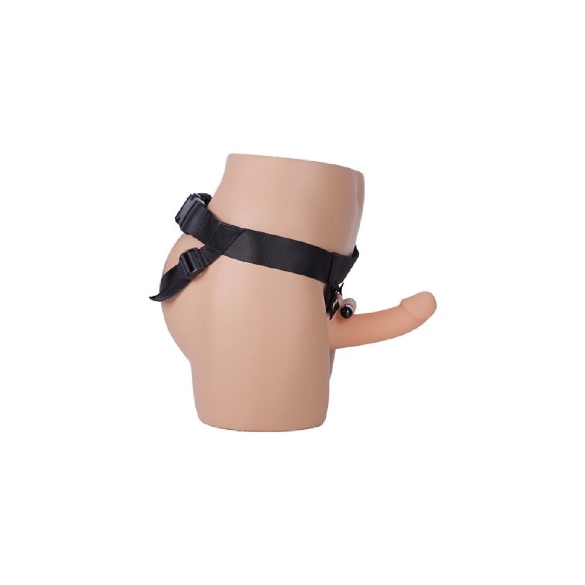 Seven-inch silicone hollow dong with harness