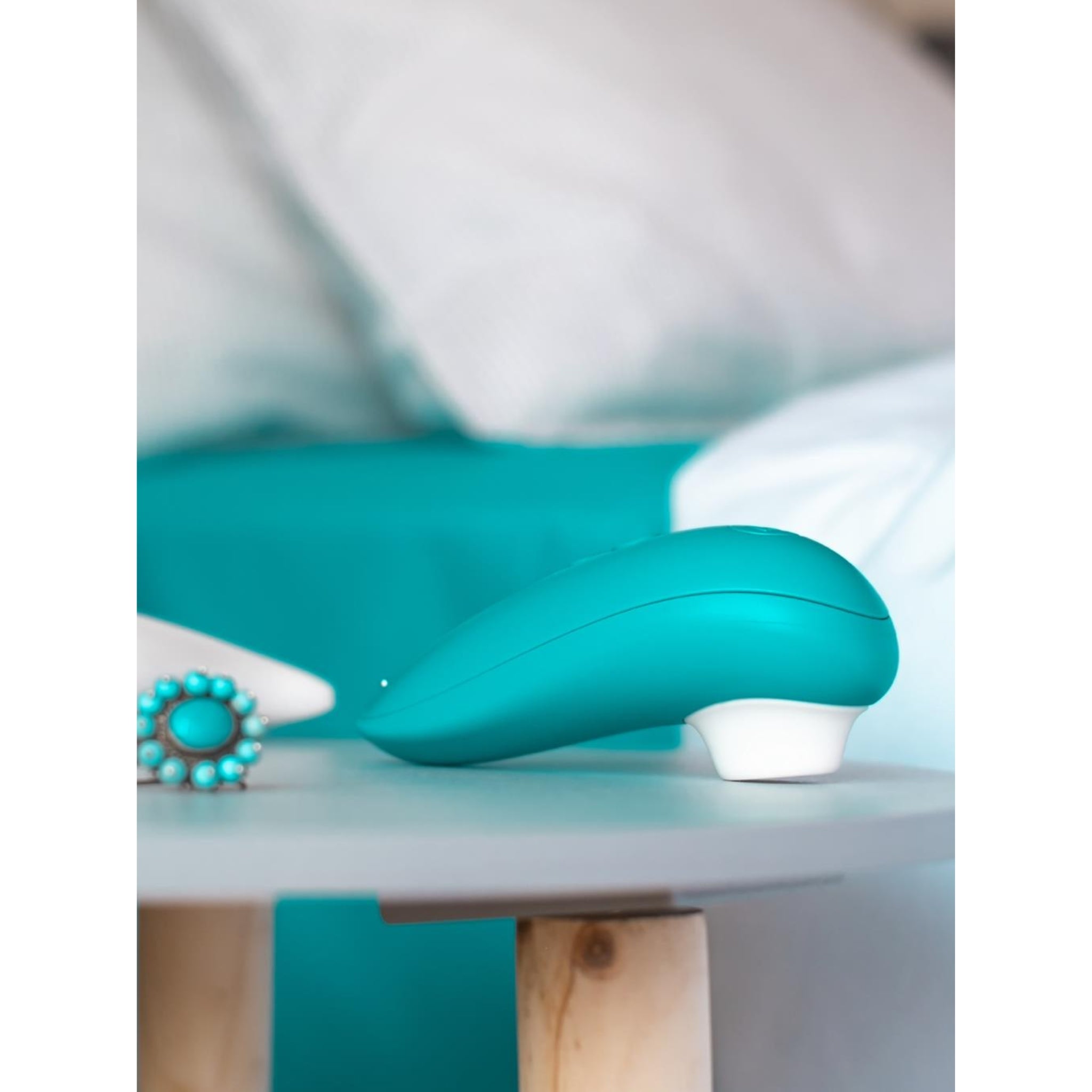Starlet 3 by Womanizer featuring air-pulse technology and ergonomic, travel-friendly shape