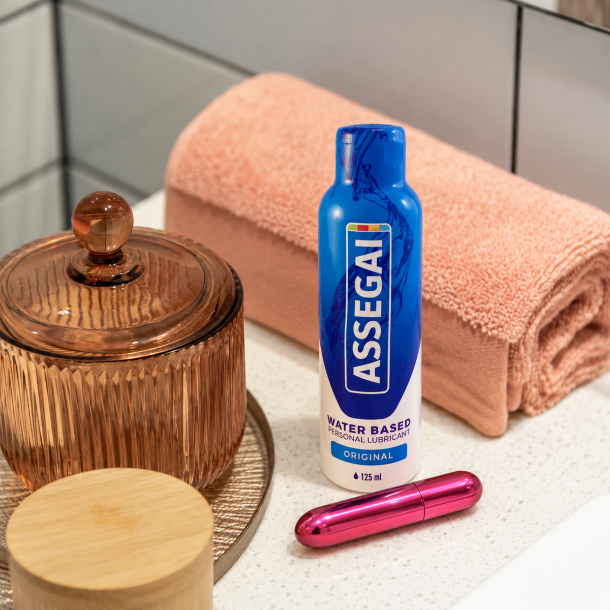 Swan Compact Bullet Point vibrator beside Assegai Original water-based lubricant in the Start Simple Bundle.