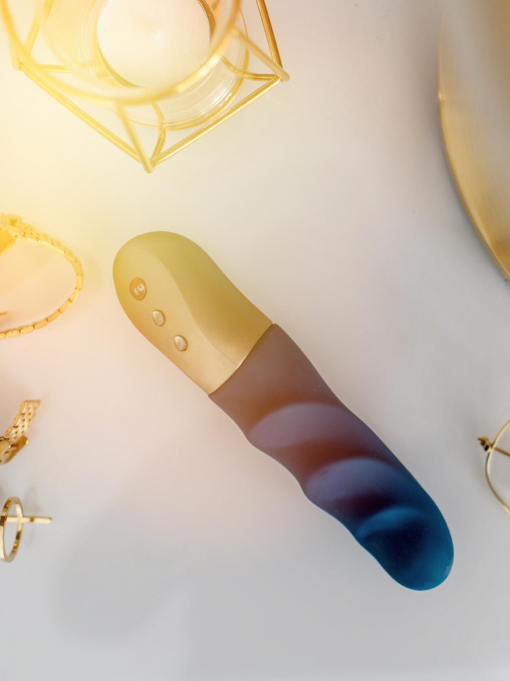 vibrator displayed on a table, highlighting lightweight build and gentle curves