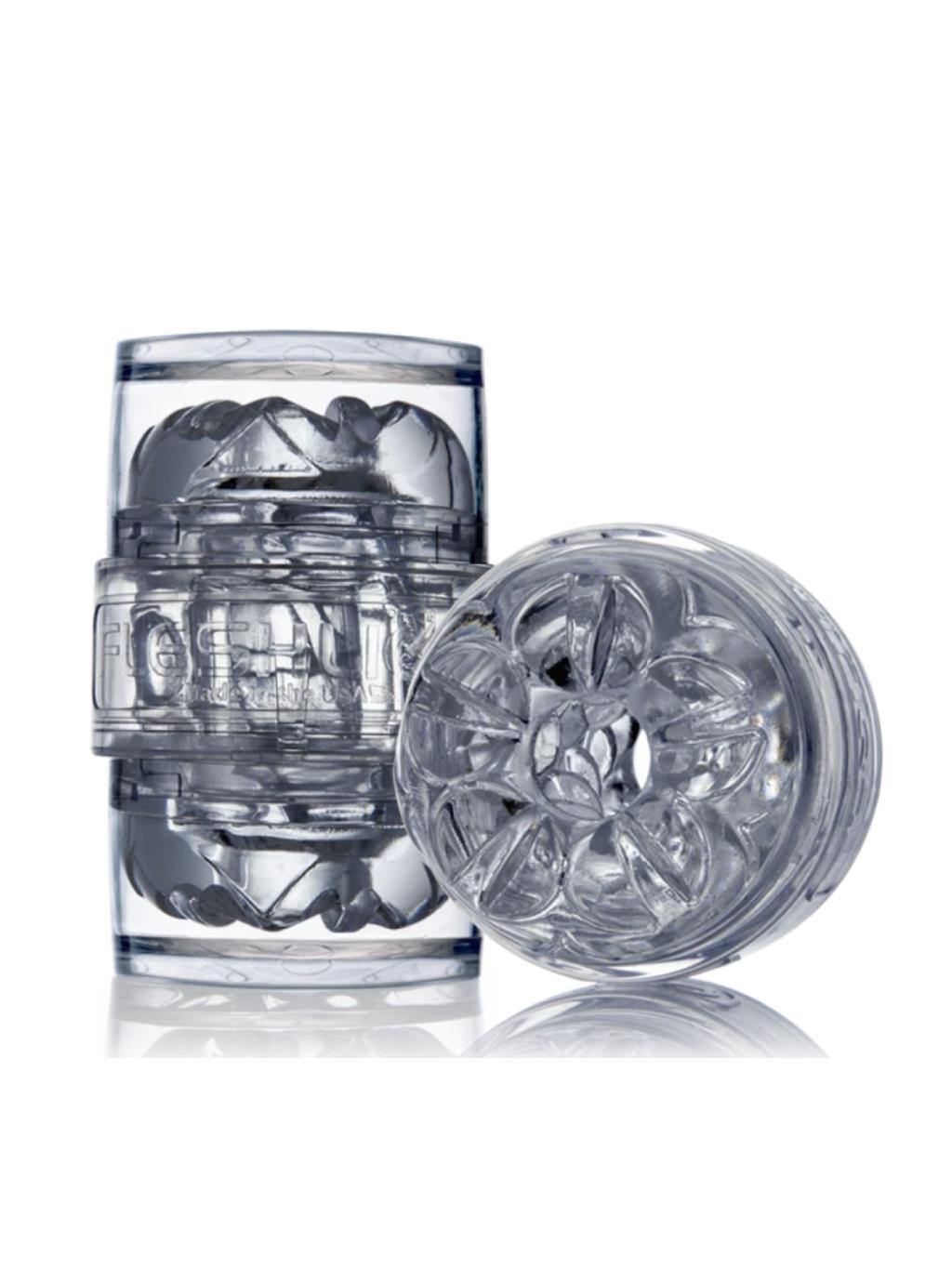 Flat lay of the Quickshot showing clear casing and textured interior, designed for compact stroking and easy cleaning.