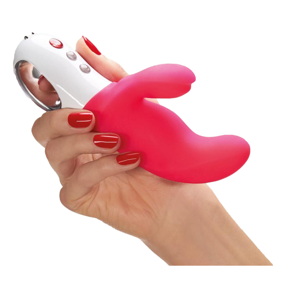 Miss Bi vibrator held in hand, highlighting compact size, ergonomic shape, and soft-touch silicone finish in pink color.